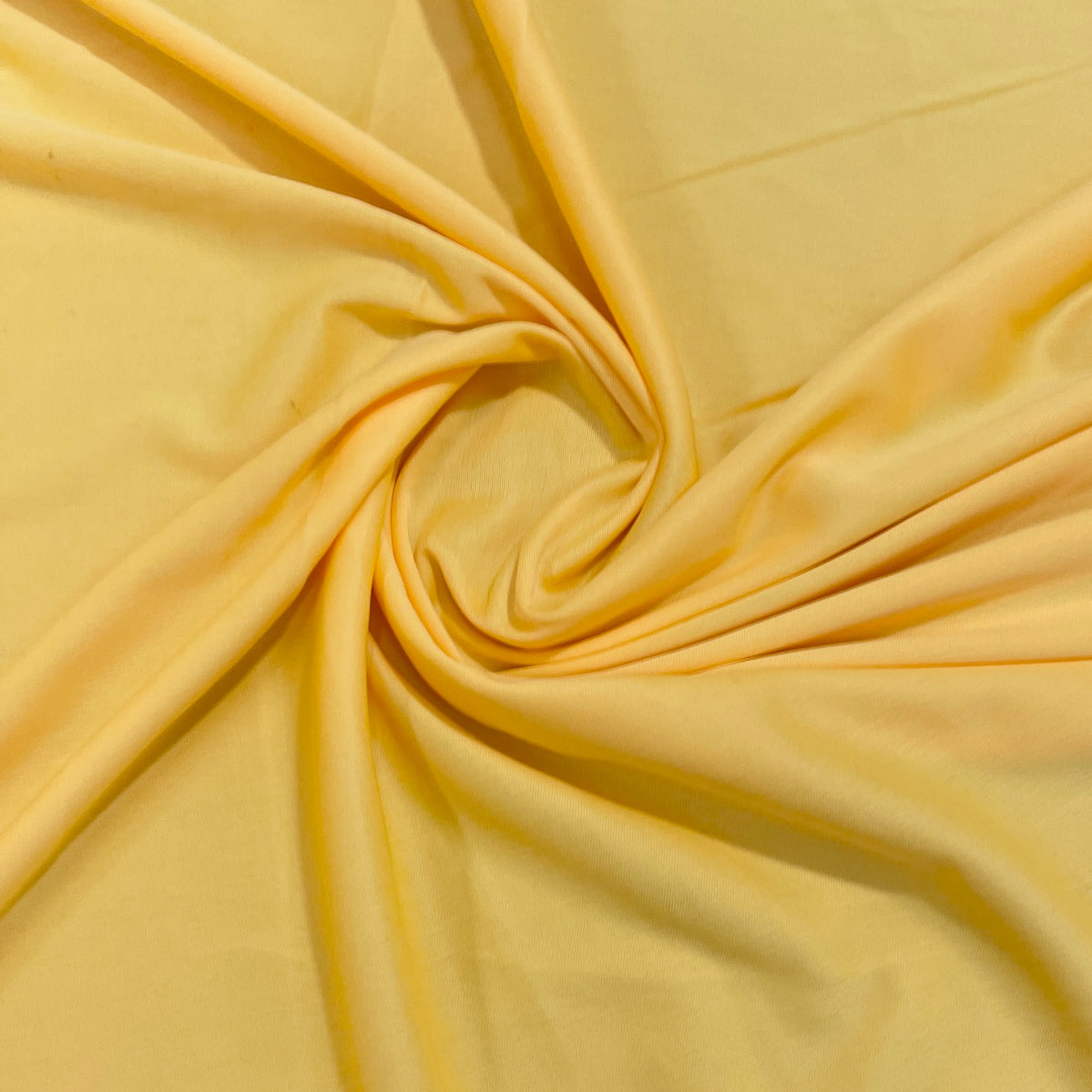 Honey Yellow Solid Lycra Dyed Fabric