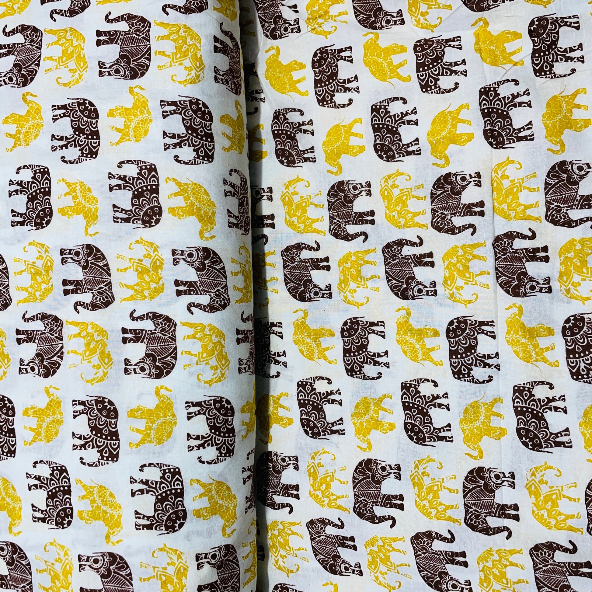 Maroon & Yellow Animal Print Cotton Fabric - TradeUNO