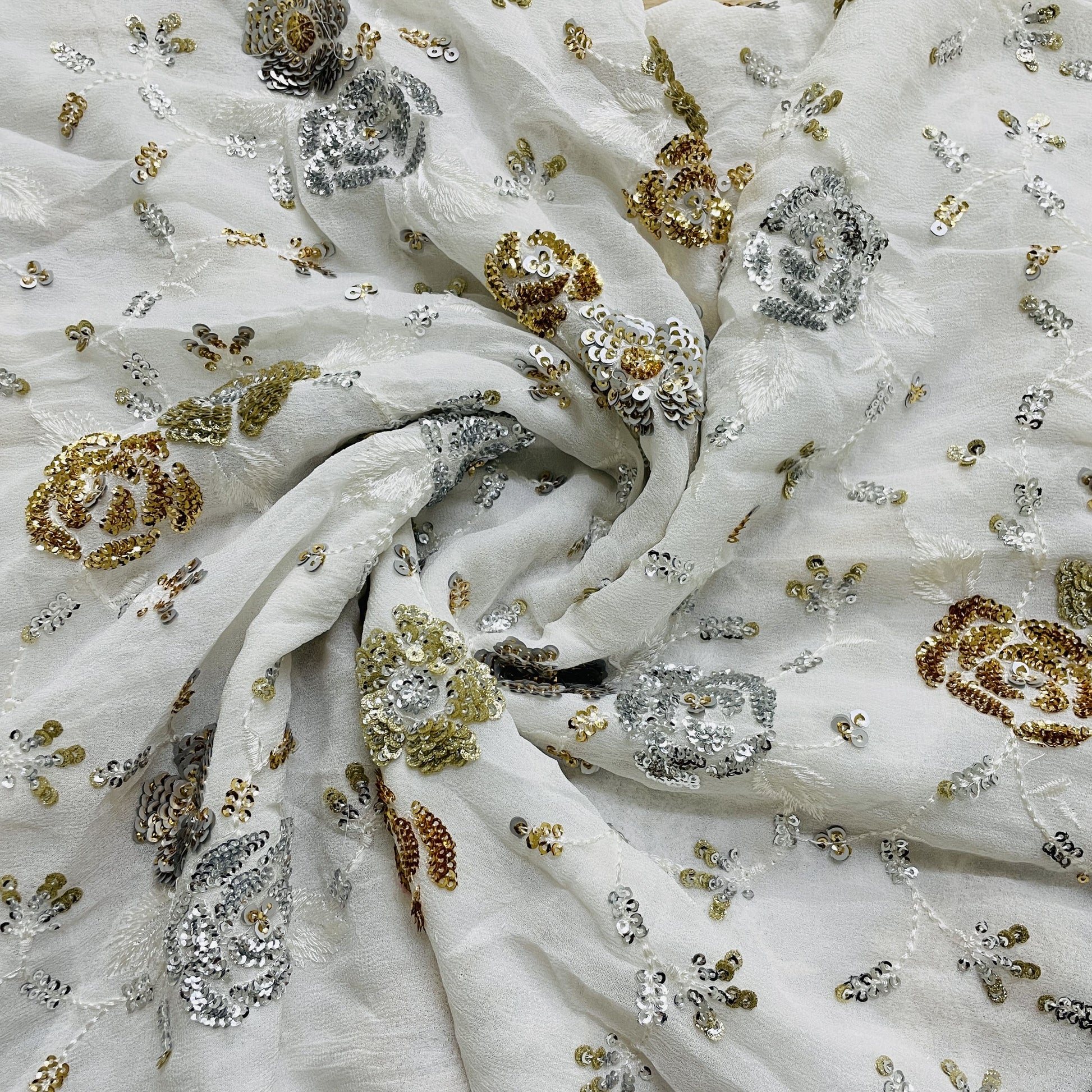 White With Gold And Silver Floral Embroidery Sequins Dyeable Viscose Georgette Fabric
