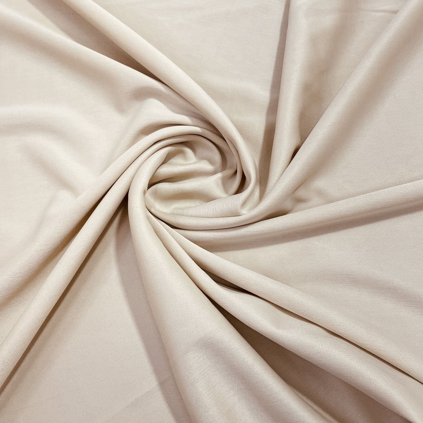 Light Beige Solid Lycra Dyed Fabric