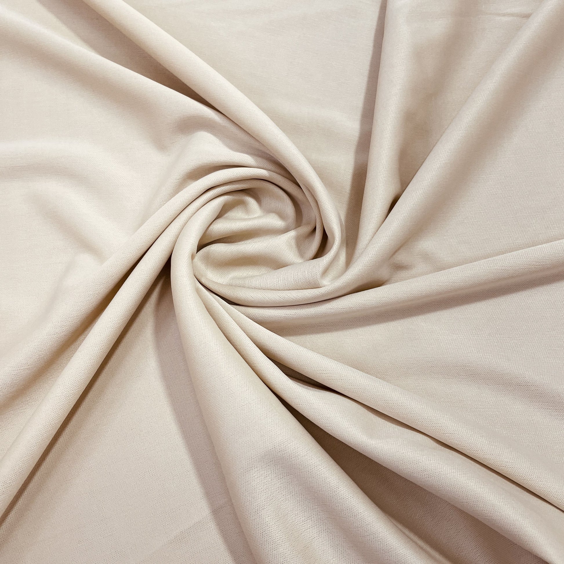 Light Beige Solid Lycra Dyed Fabric