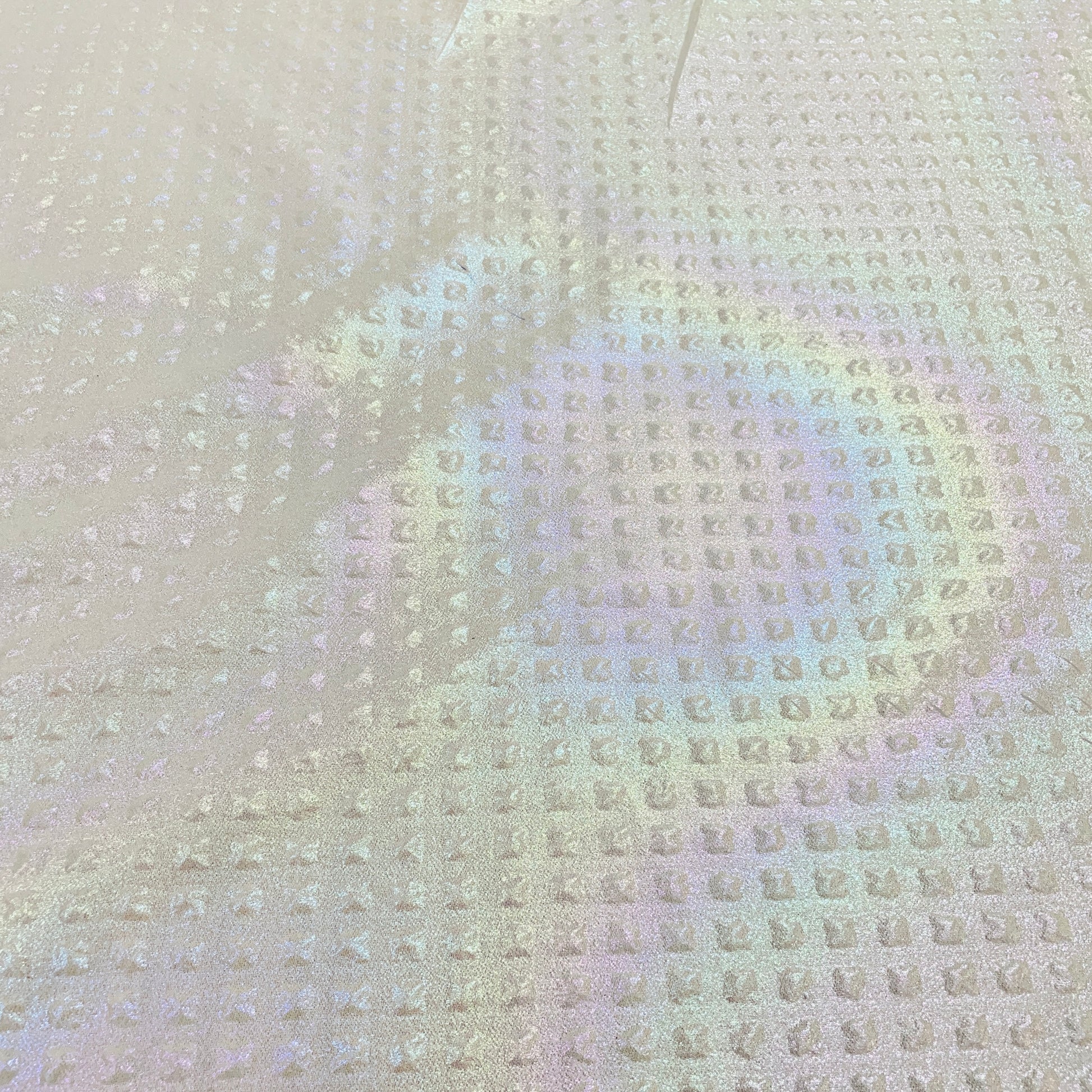 White Solid Imported 3D Rainbow Embrossed Knitted Lycra Fabric