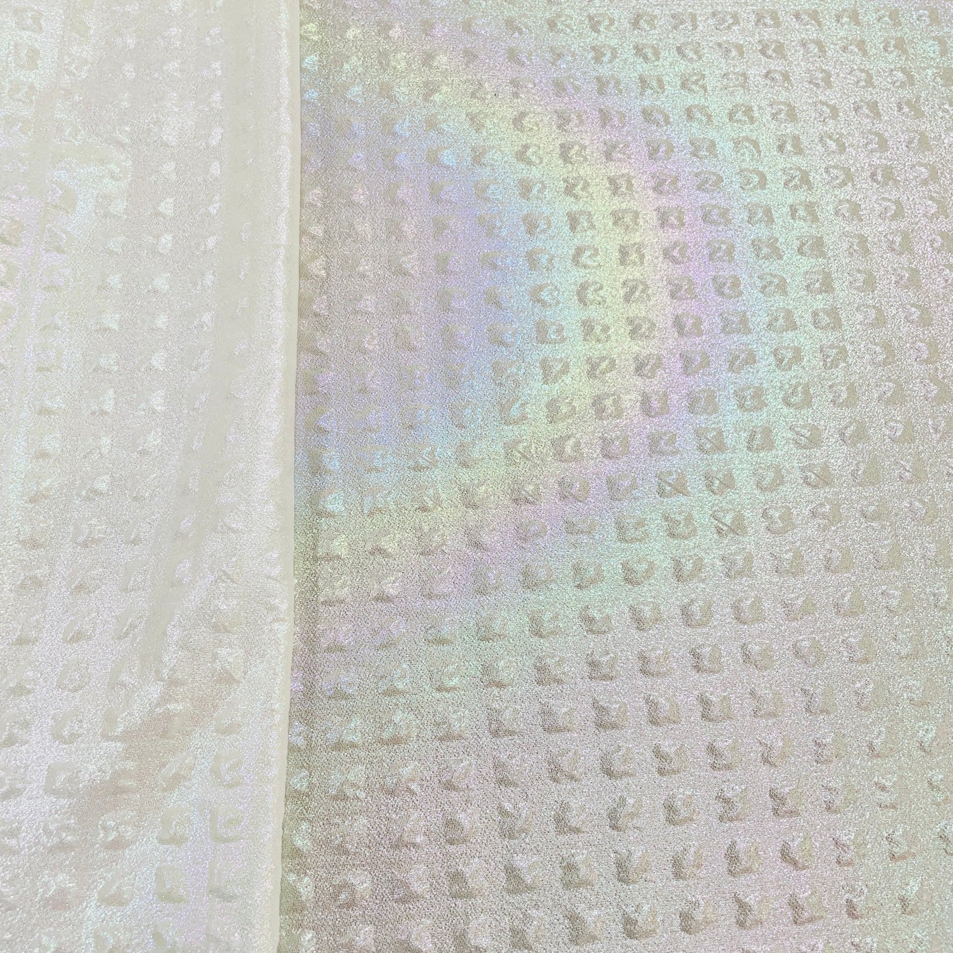 White Solid Imported 3D Rainbow Embrossed Knitted Lycra Fabric