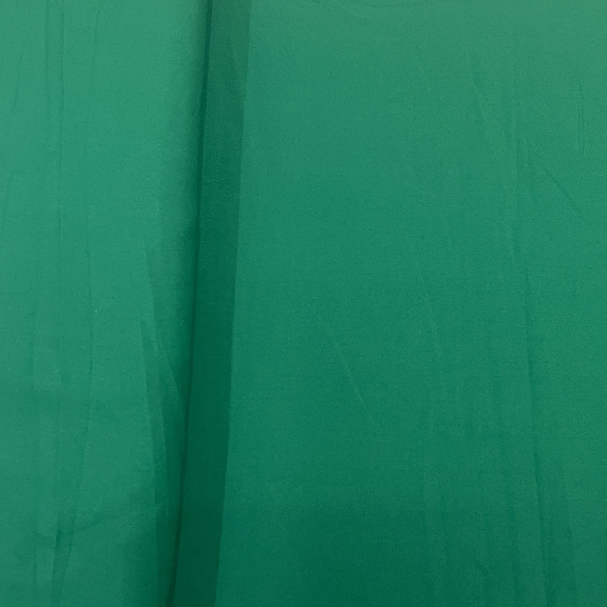 Exclusive Pine Green Solid Malai Crepe Fabric