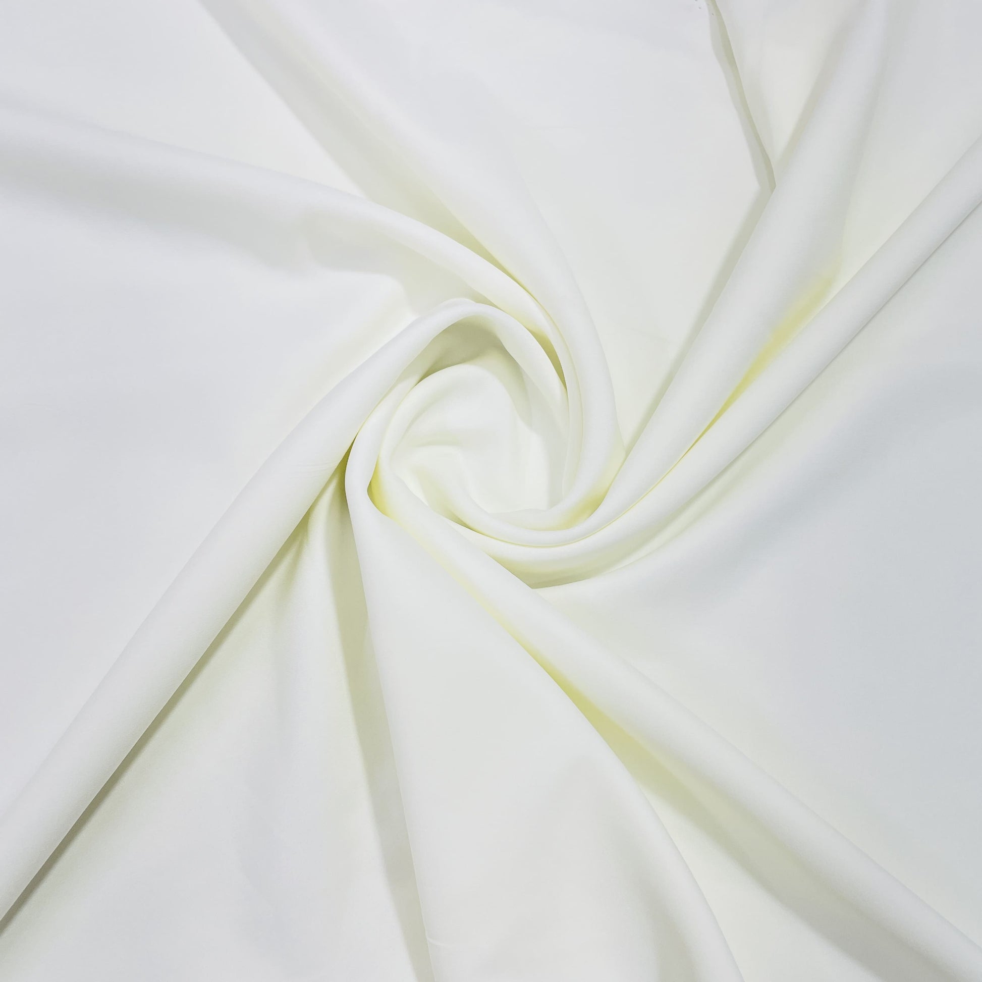 Exclusive Ivory Solid Malai Crepe Fabric