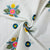 White & Multicolor Floral Thread Embridery Cotton Fabric - TradeUNO