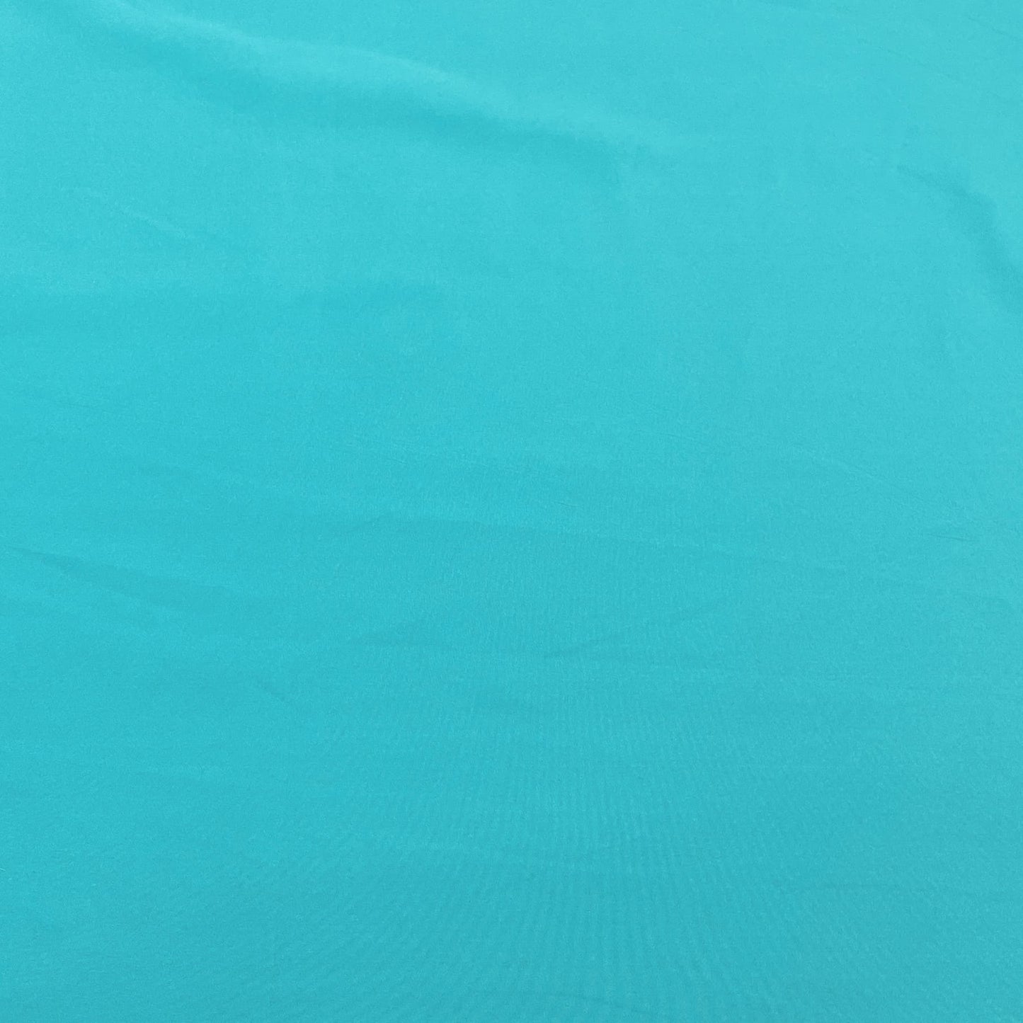 Exclusive Turquoise Green Solid Malai Crepe Fabric