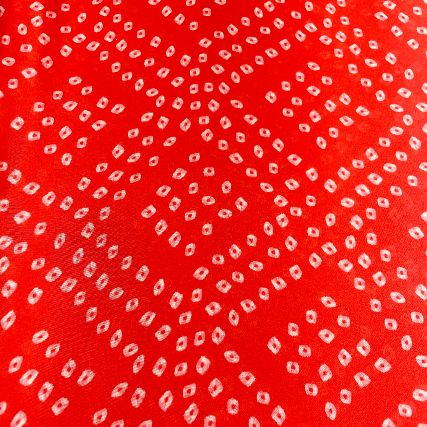 Red Bandhani Print Georgette Satin Fabric - TradeUNO