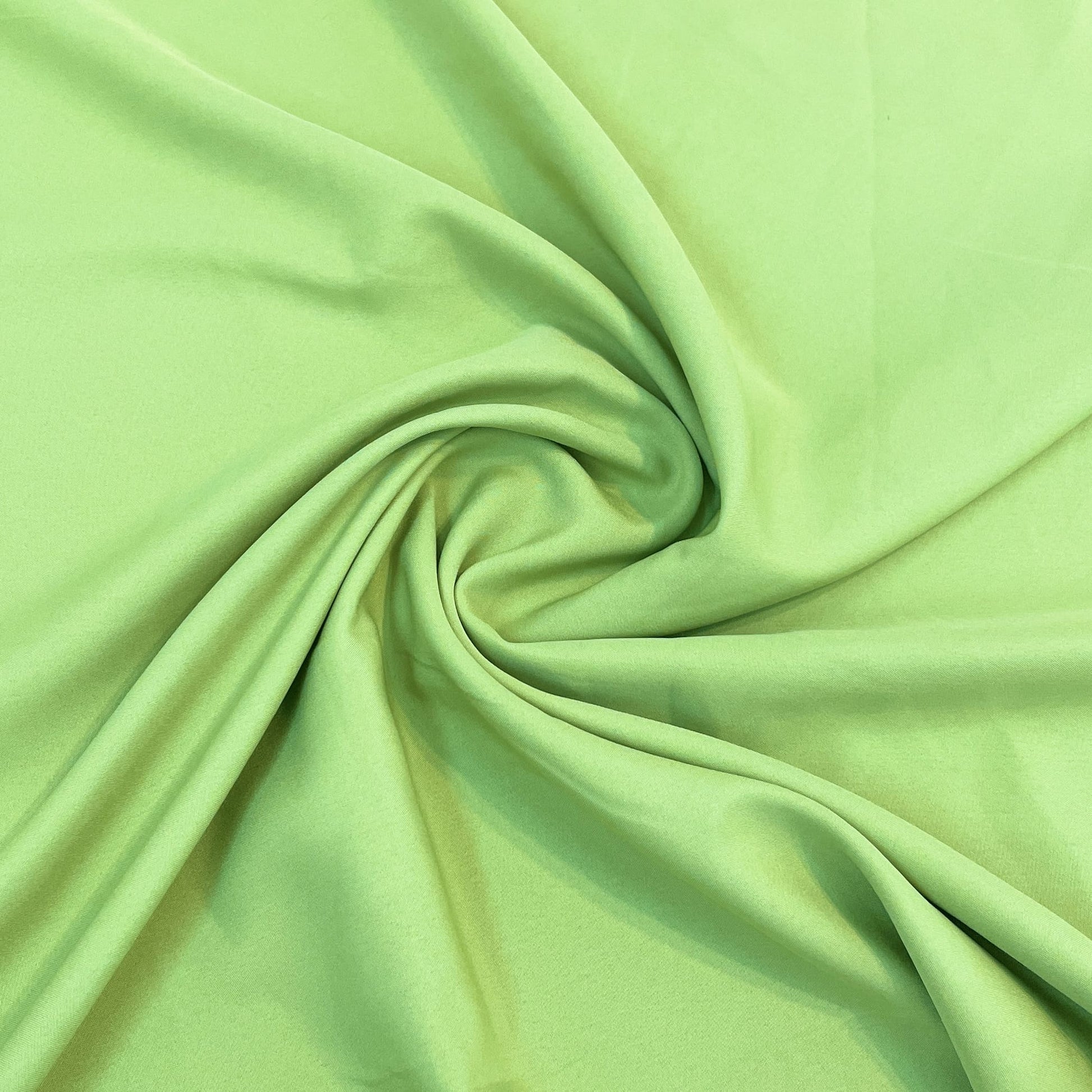 Exclusive Pear Green Solid Malai Crepe Fabric