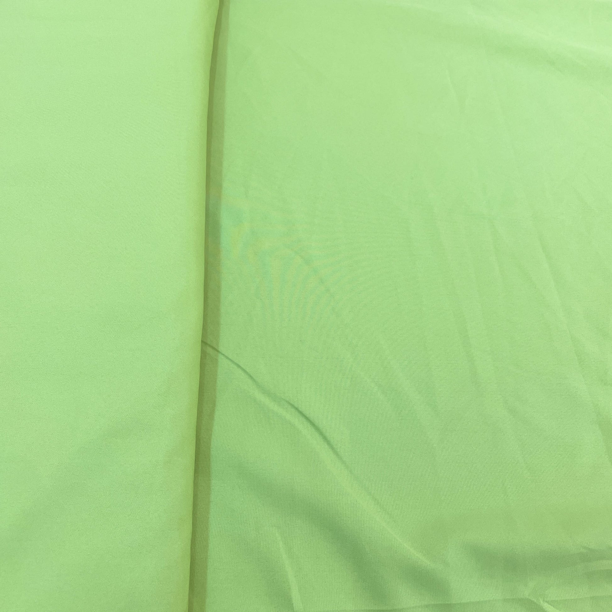 Exclusive Pear Green Solid Malai Crepe Fabric