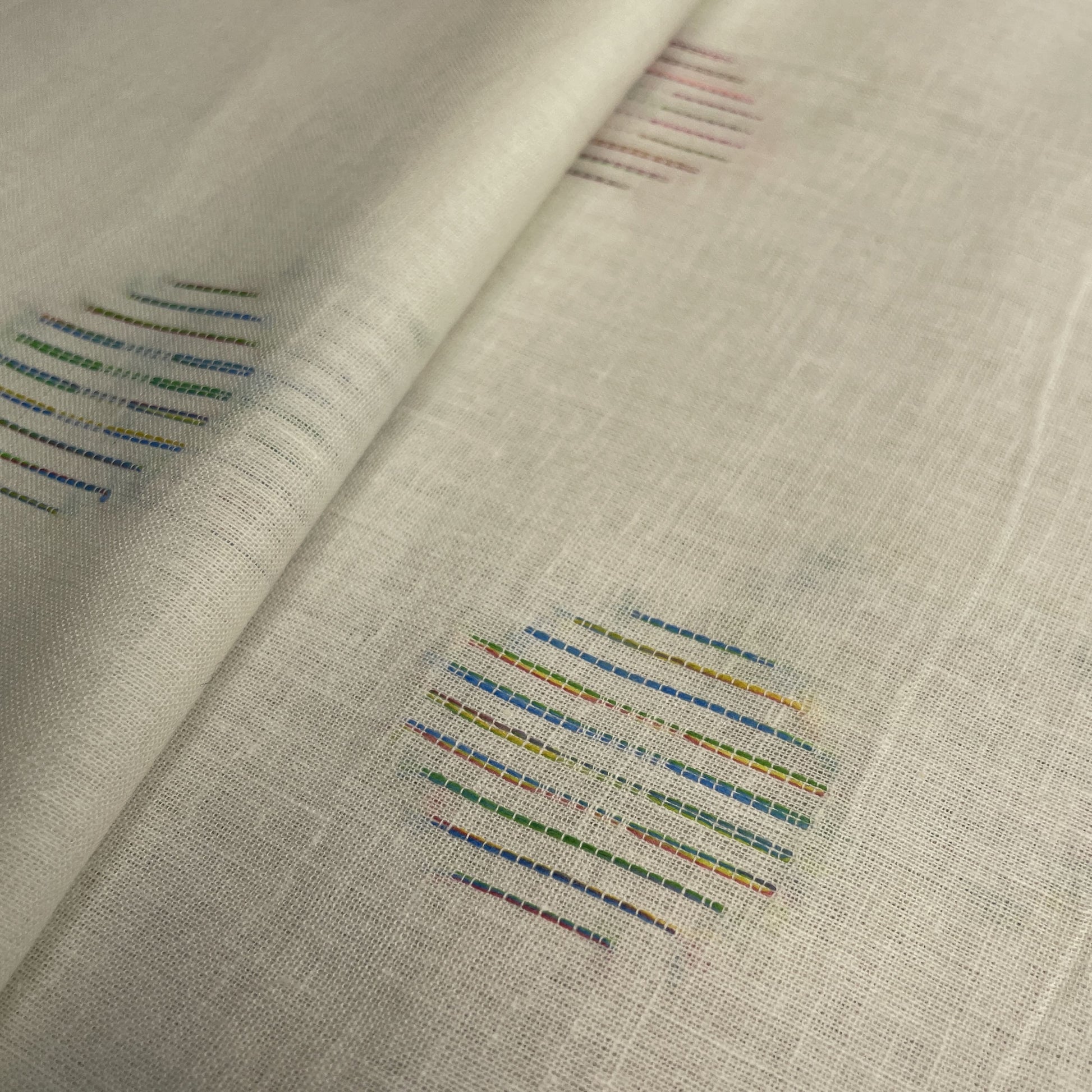 Premium White Multicolor Dobby Embroidery Dyeable Cotton Fabric