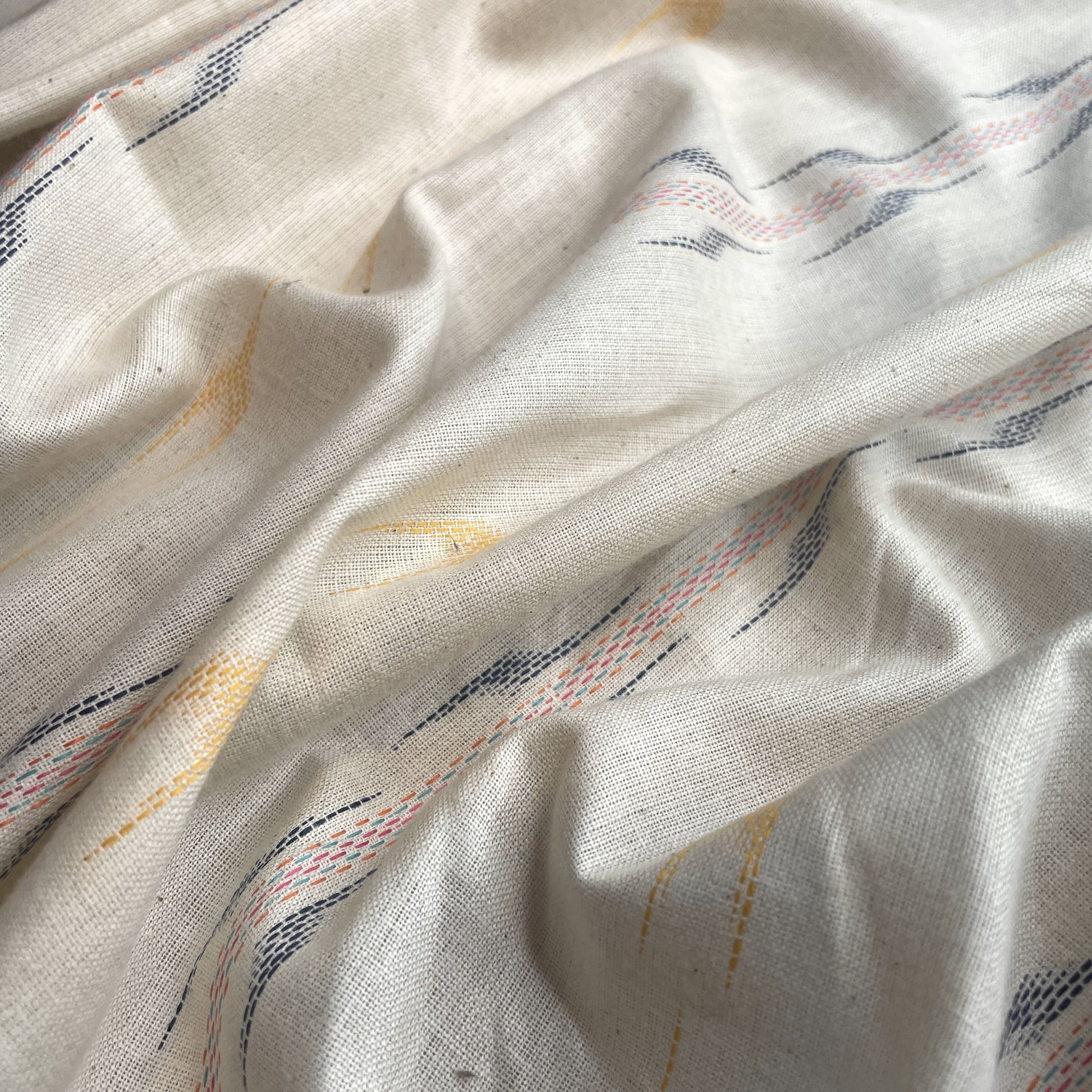 Premium OffWhite Yellow Ikkat Dobby Embroidery Cotton Fabric
