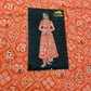 Orange Traditional Print Georgette Satin Fabric - TradeUNO