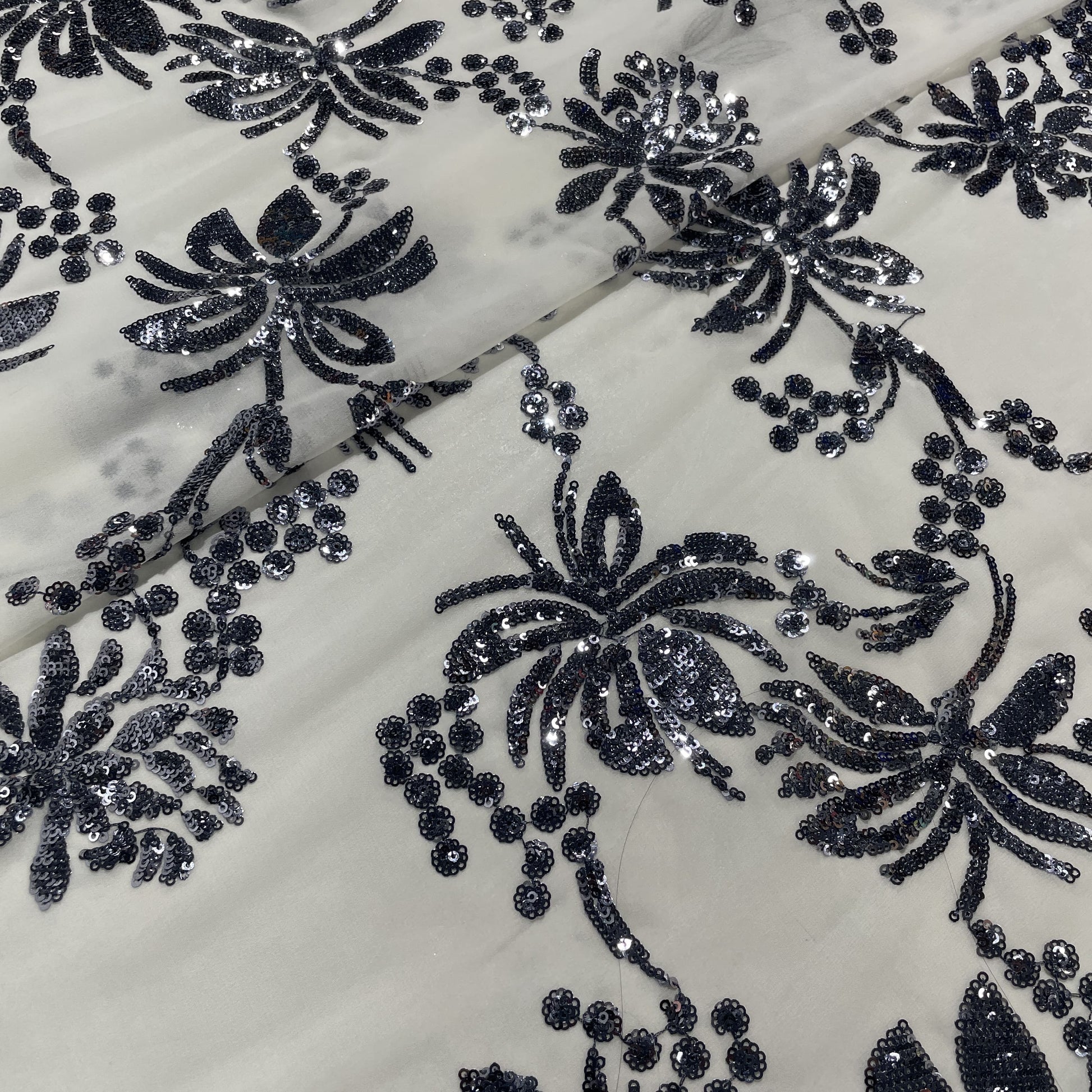 White & Black Floral Sequence Embroidery Georgette Fabric