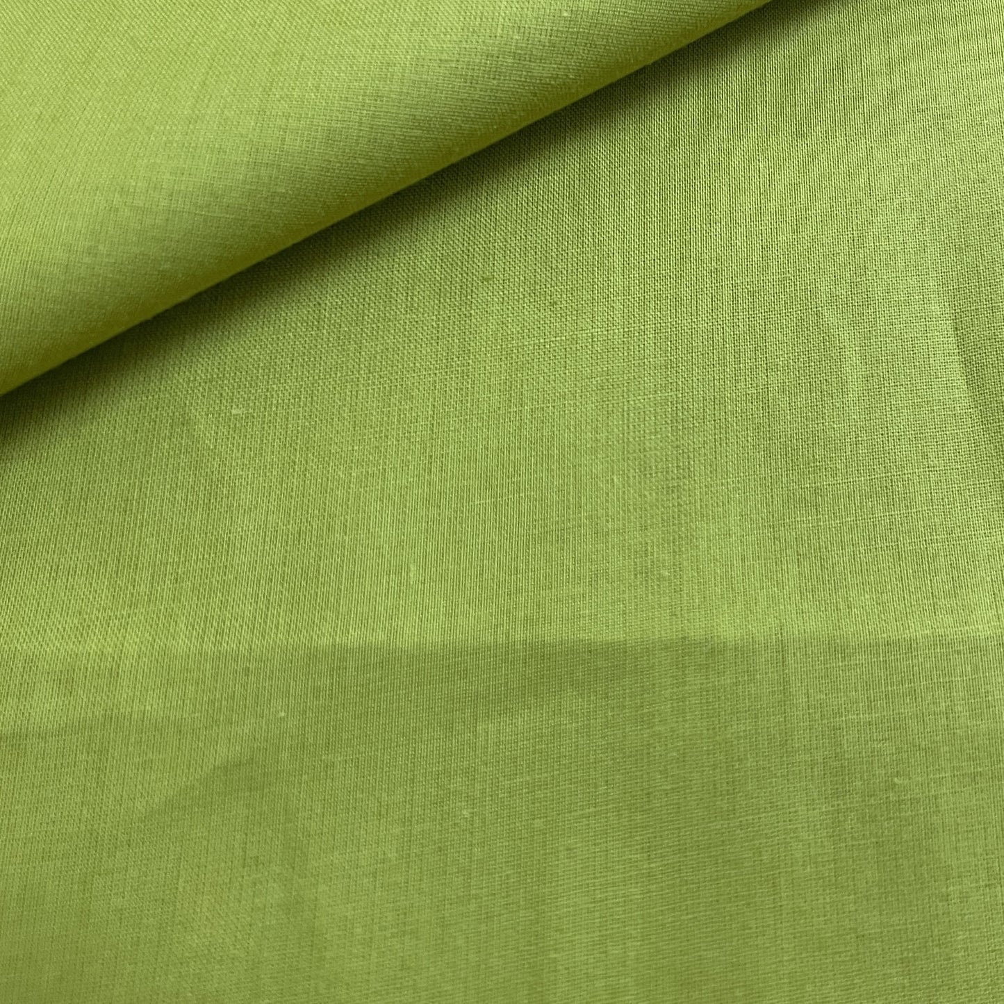 Premium Lemon Green Solid Cotton Mulmul Fabric