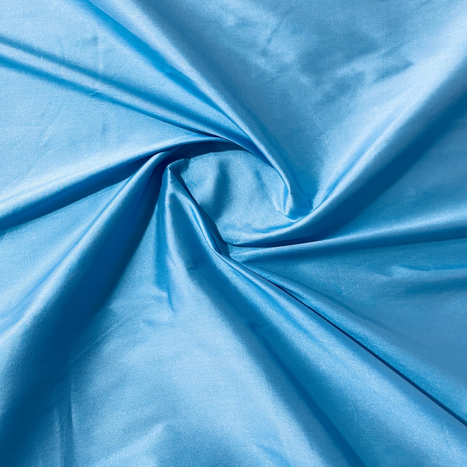 Buy Sky Blue Solid Silk Taffeta Fabric Online – TradeUNO Fabrics
