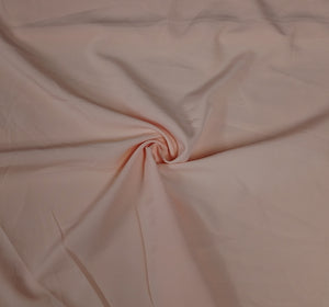 Peach Solid Malai Crepe Fabric - TradeUNO