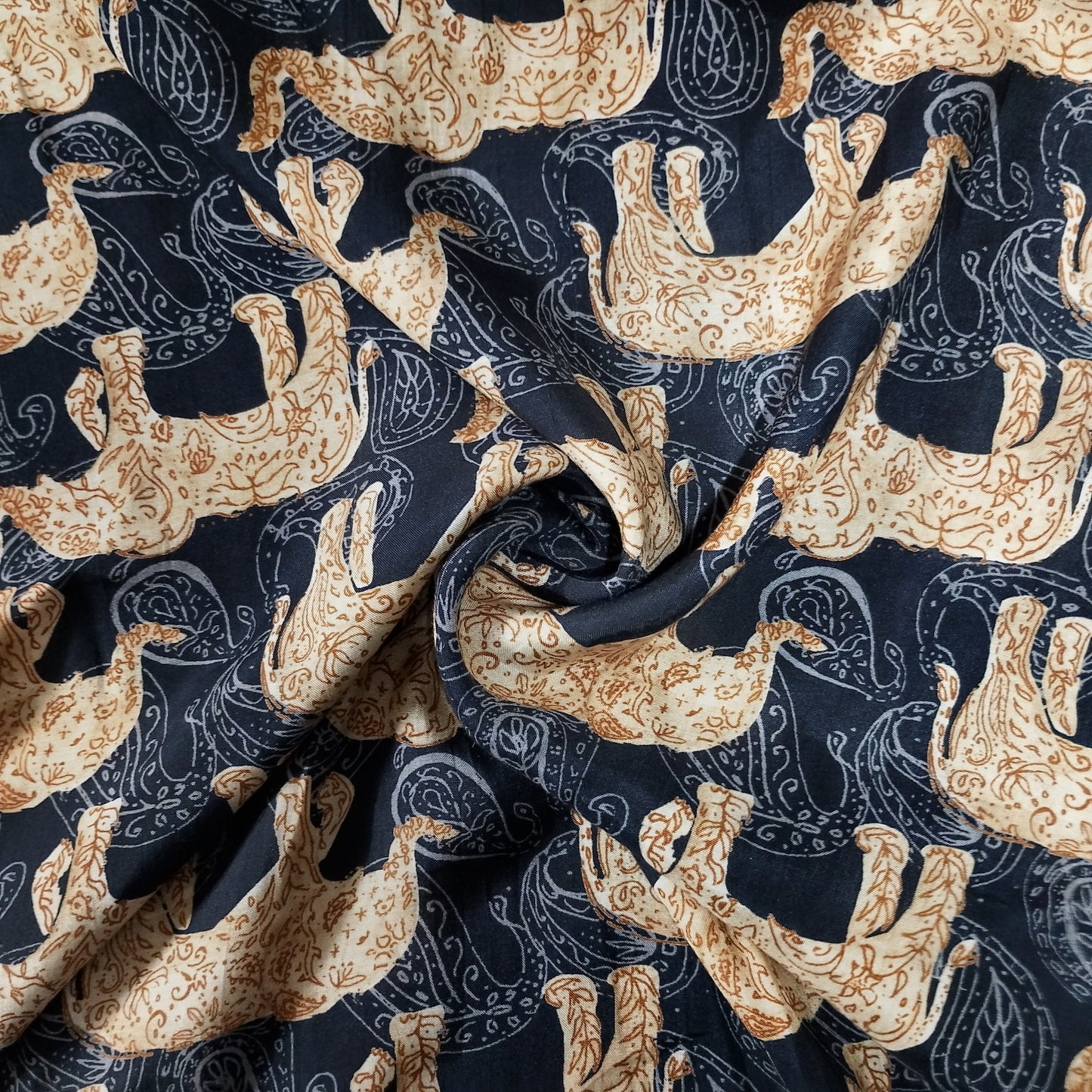 Black Pichwai Border Print Muslin Fabric