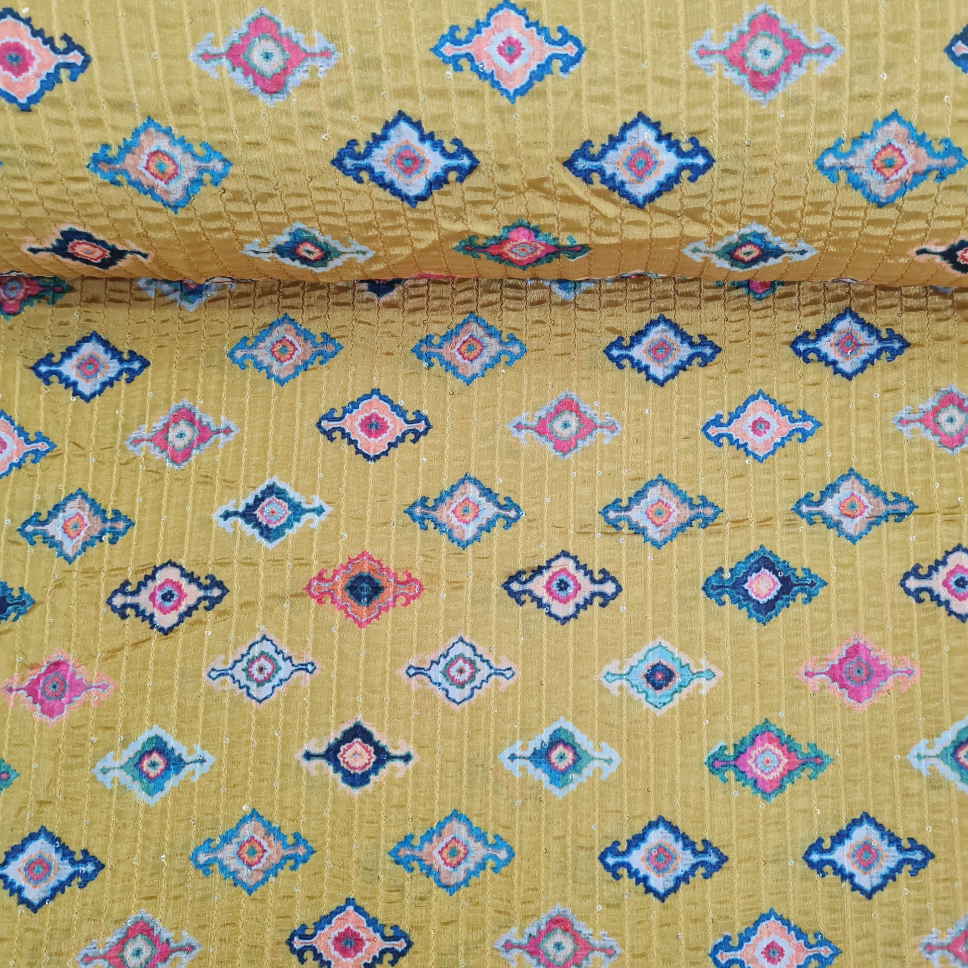 Mustard Patola Position Print Sequence Chinon Fabric - TradeUNO