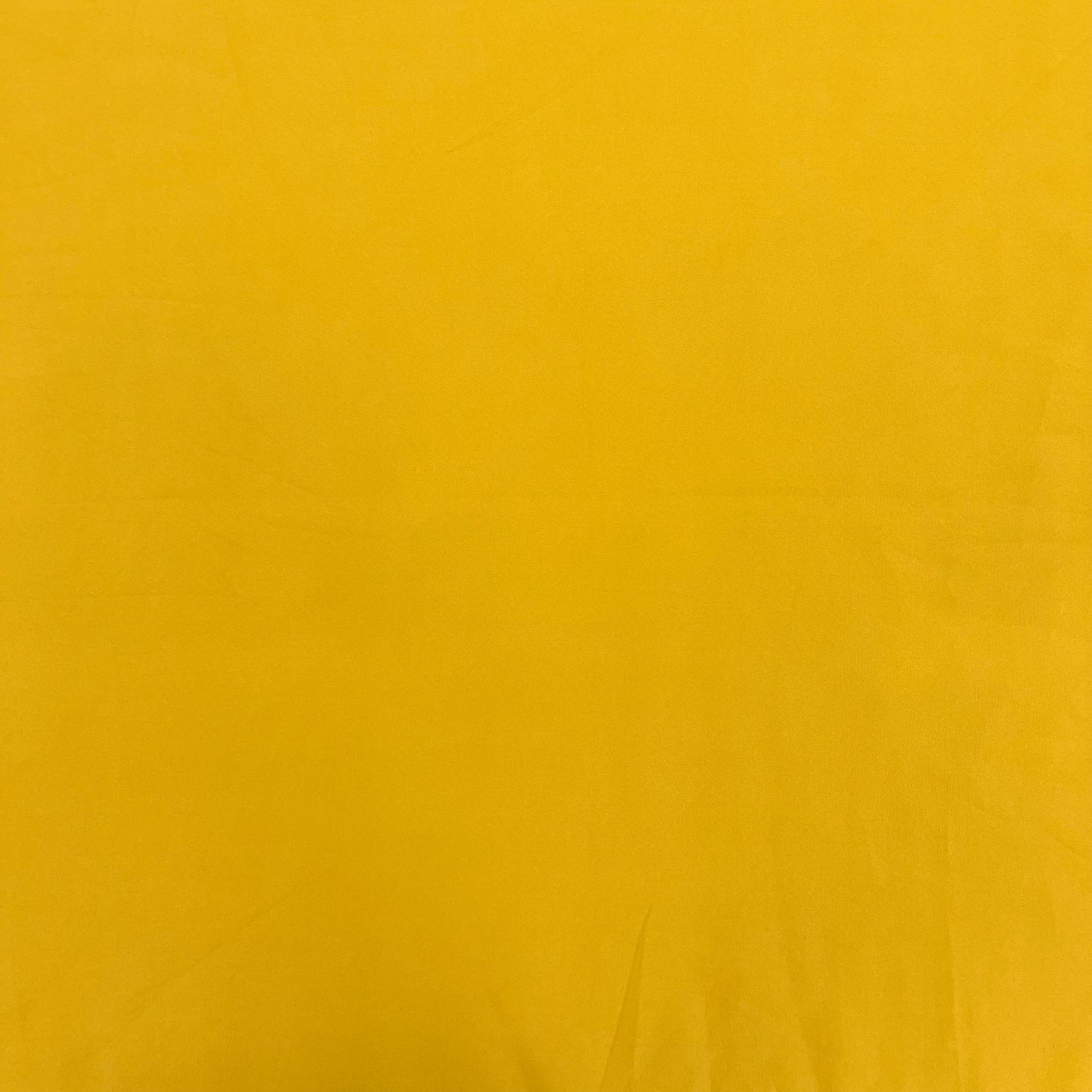 Mustard Yellow Solid Banana Crepe Fabric - TradeUNO