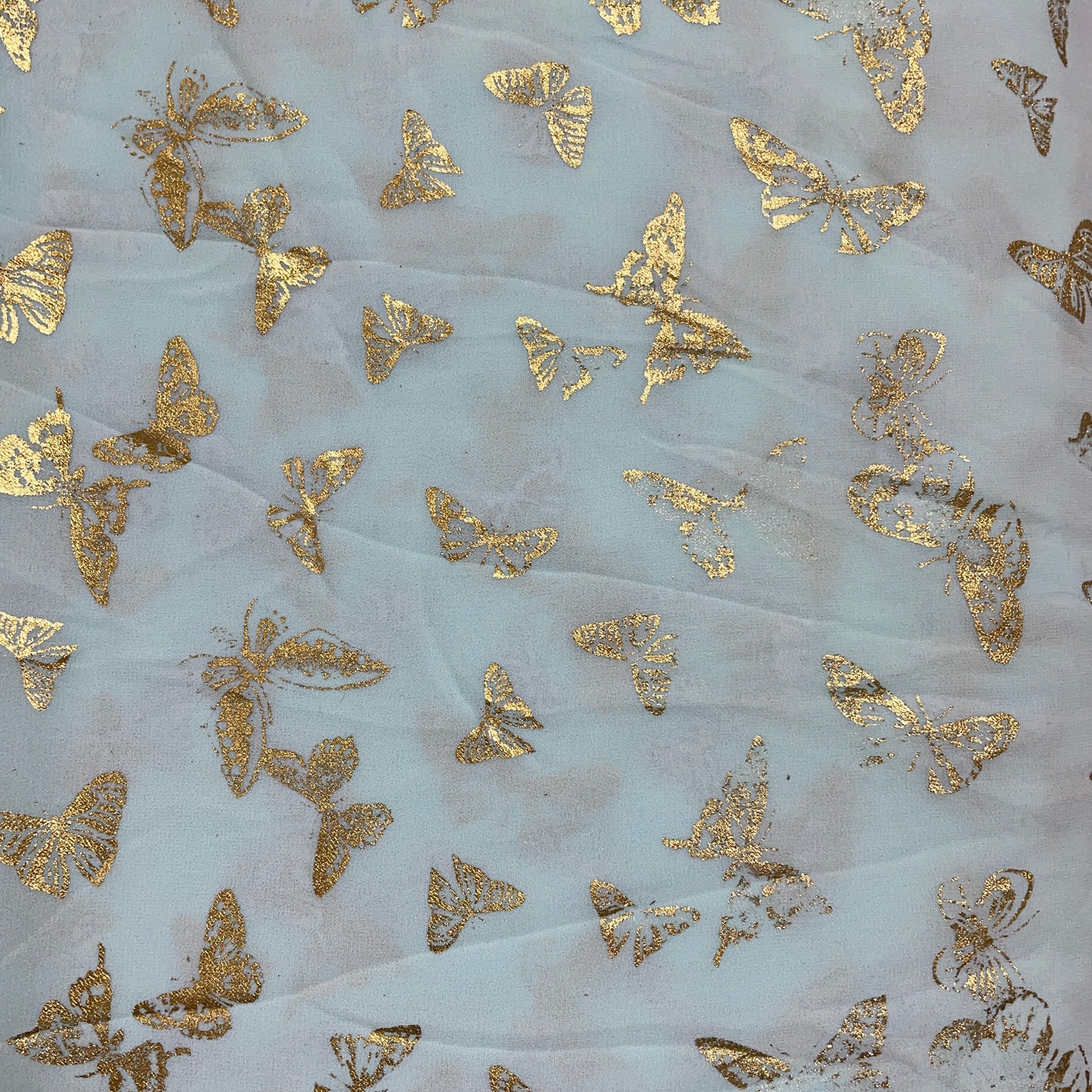 Turquoise Green With Gold Zari Butterfly Print Georgette Fabric - TradeUNO