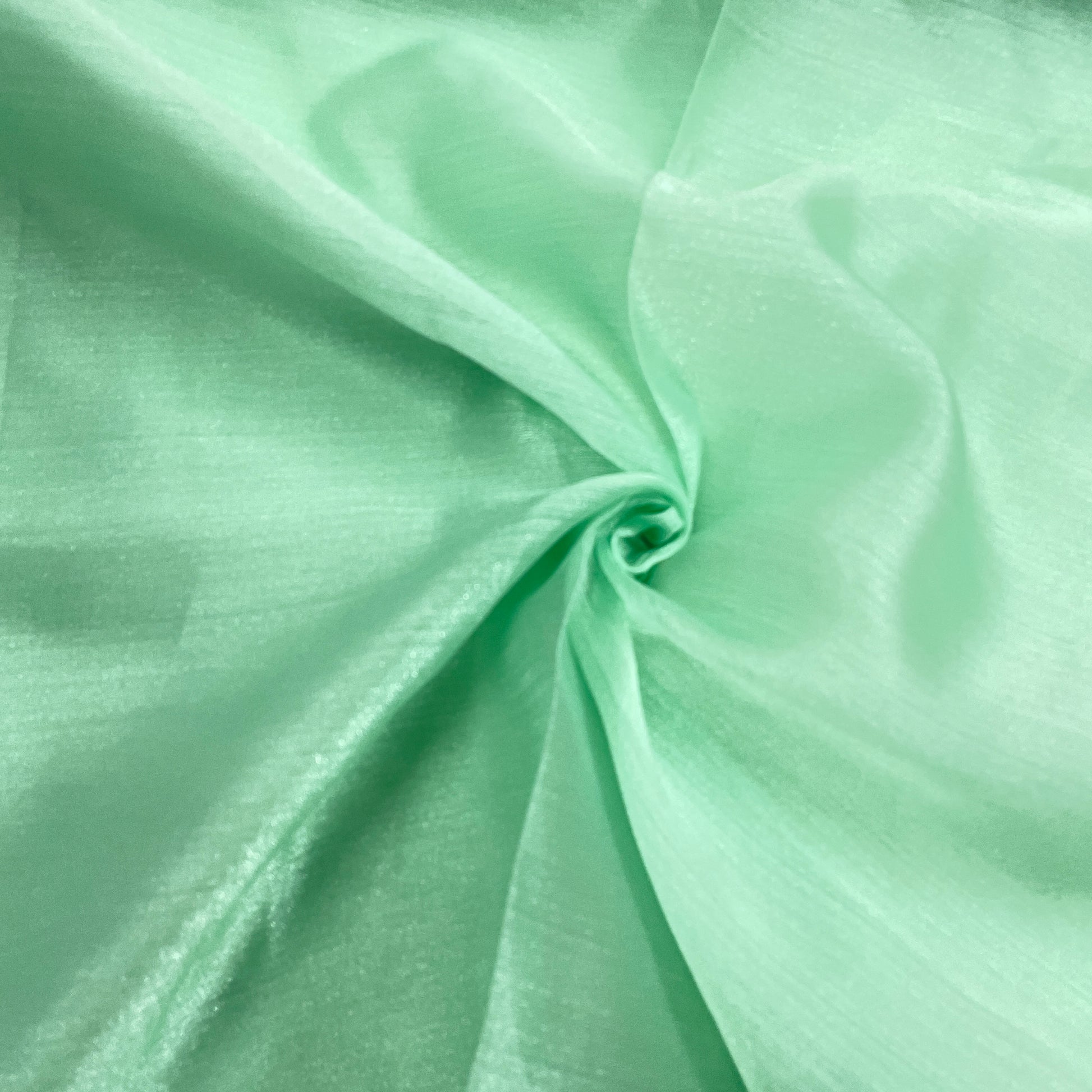 emblred green solid tissue fabric