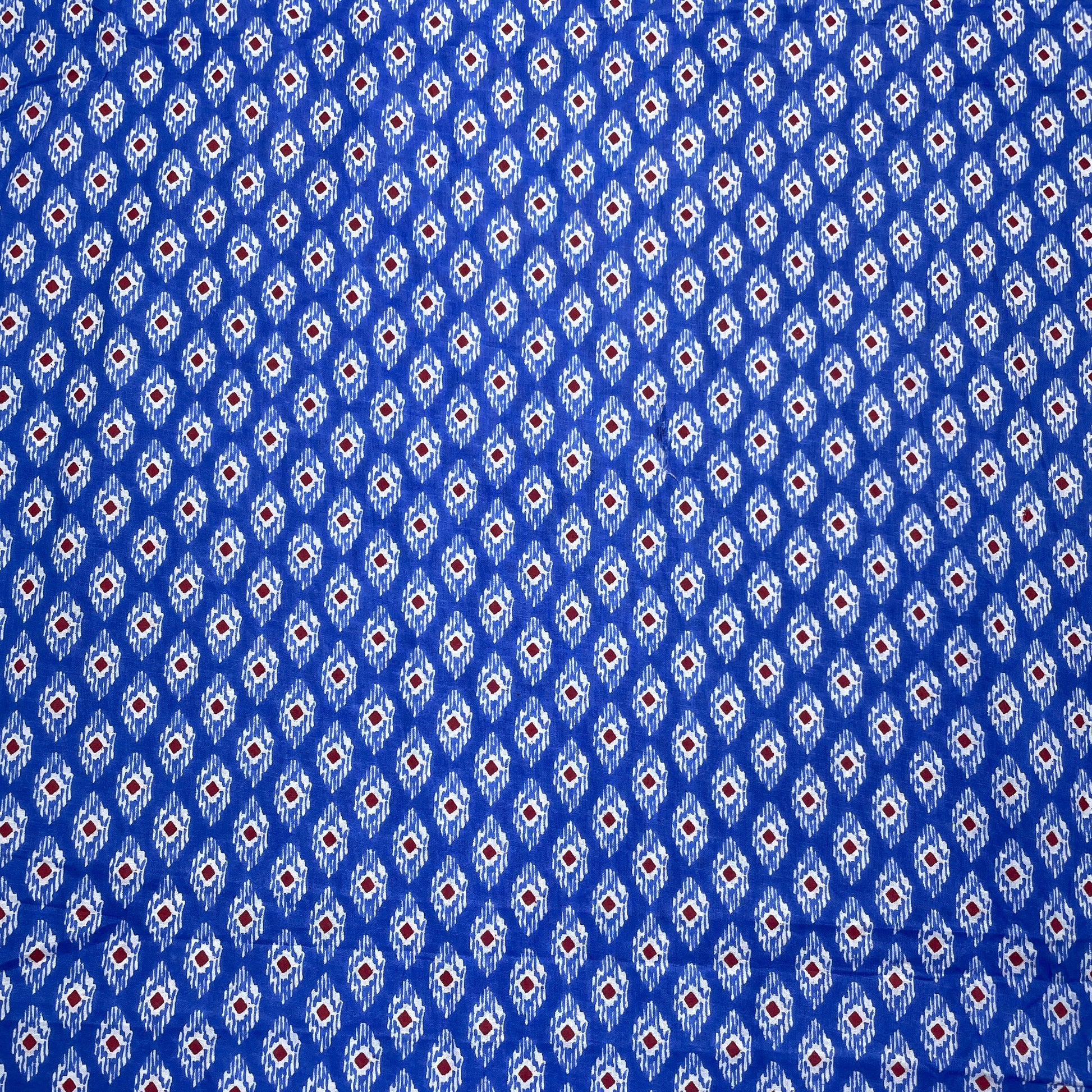 Blue & Red Ikkat Print Cotton Fabric - TradeUNO