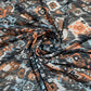 Premium Orangee Black Ikkat Print Chiffon Fabric