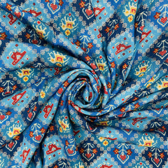 Blue ikkat patola with gold foil Chanderi Jacquard Fabric - TradeUNO