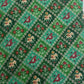 Green Ikat Patola With Dold Foil Chanderi Jacquard Fabric - TradeUNO