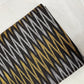 Grey With Golden Ikkat Print Cotton Fabric - TradeUNO