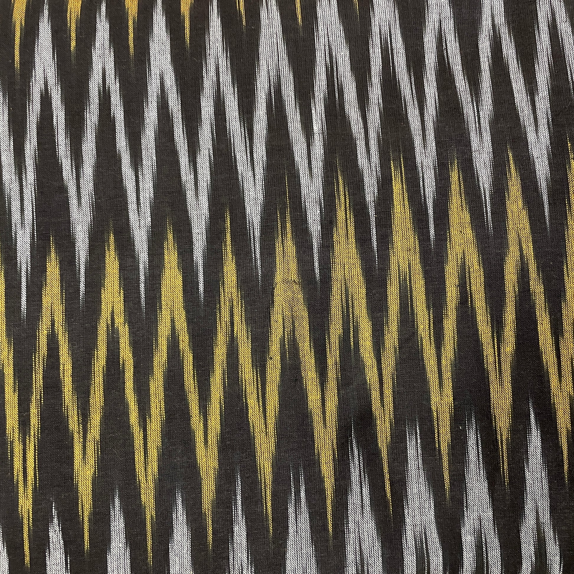 Grey With Golden Ikkat Print Cotton Fabric - TradeUNO