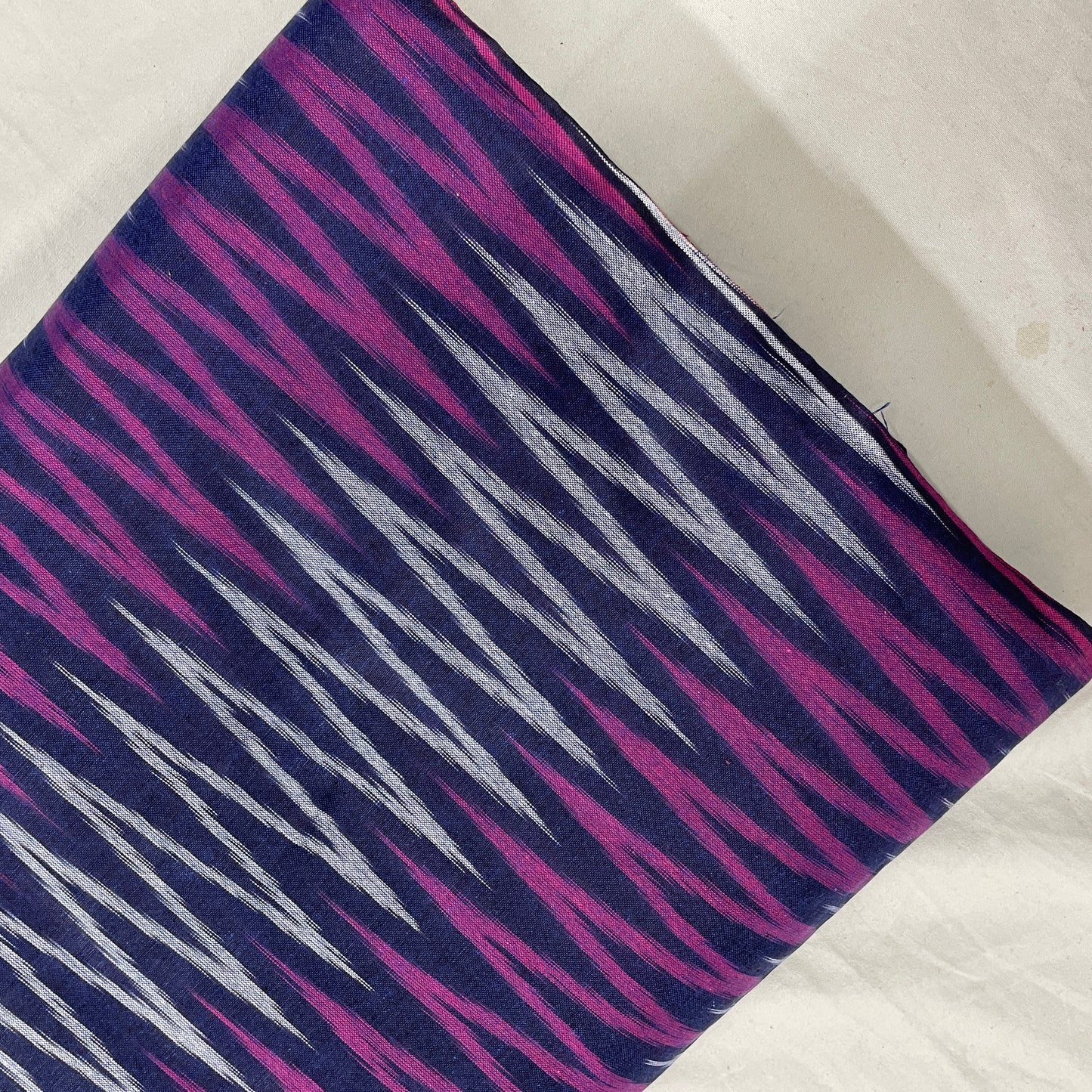 Dark Blue With Pink Ikkat Print Cotton Fabric - TradeUNO