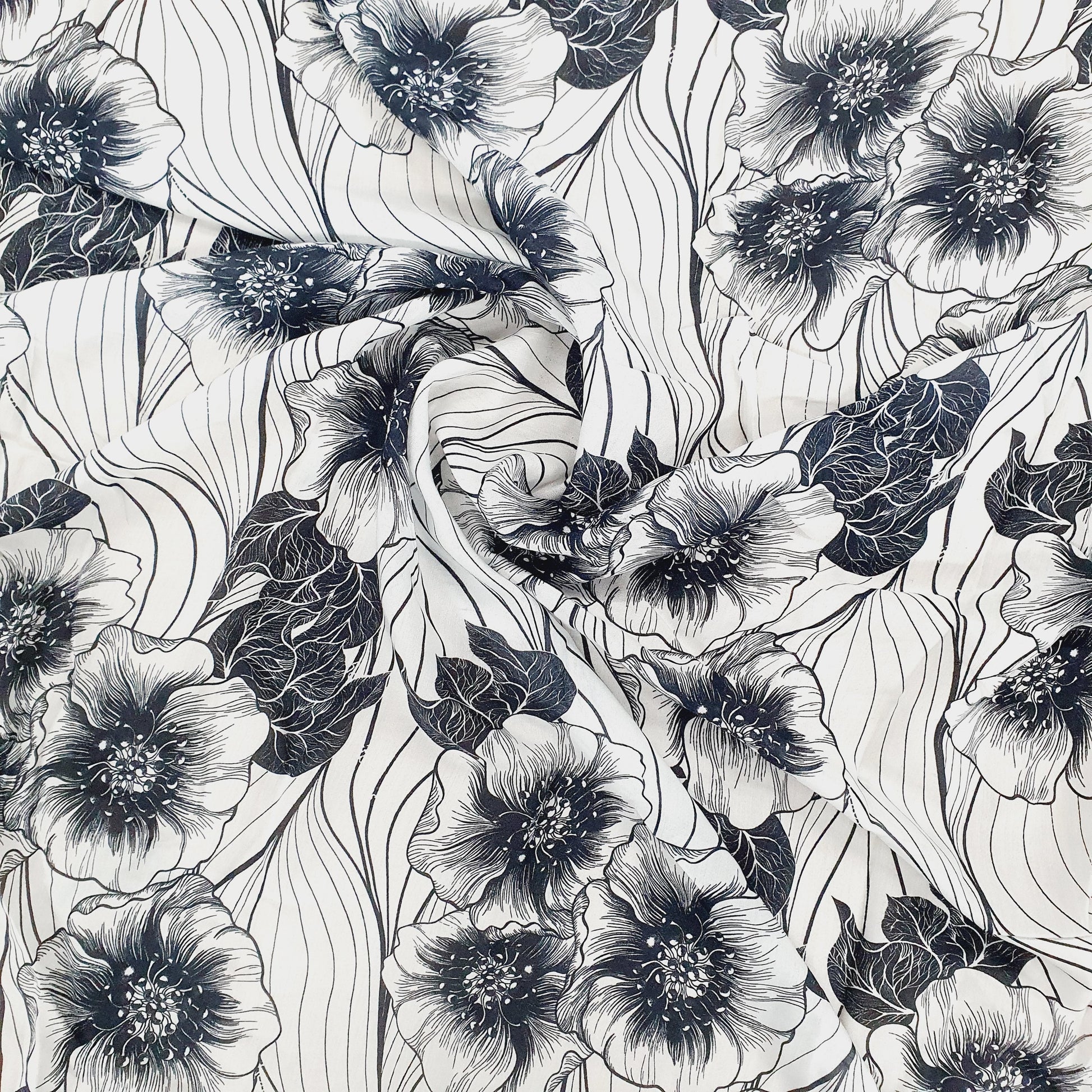 White & Black Floral Print Poly Viscose Fabric Trade UNO