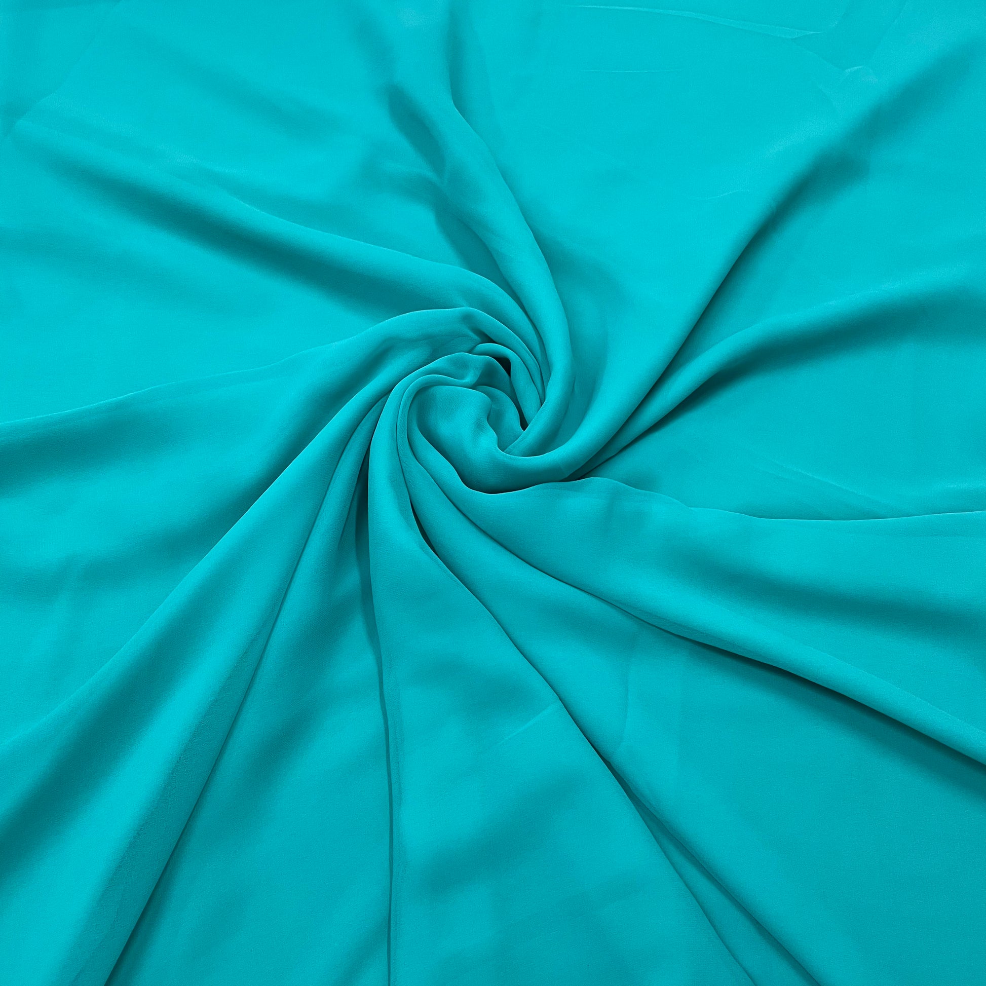 Turquoise Blue Solid Georgette Fabric - TradeUNO