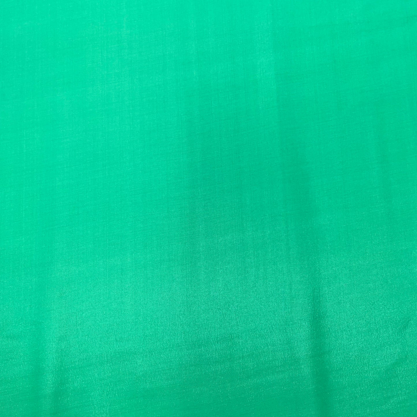 Parrot Green Solid Santoon Fabric - TradeUNO