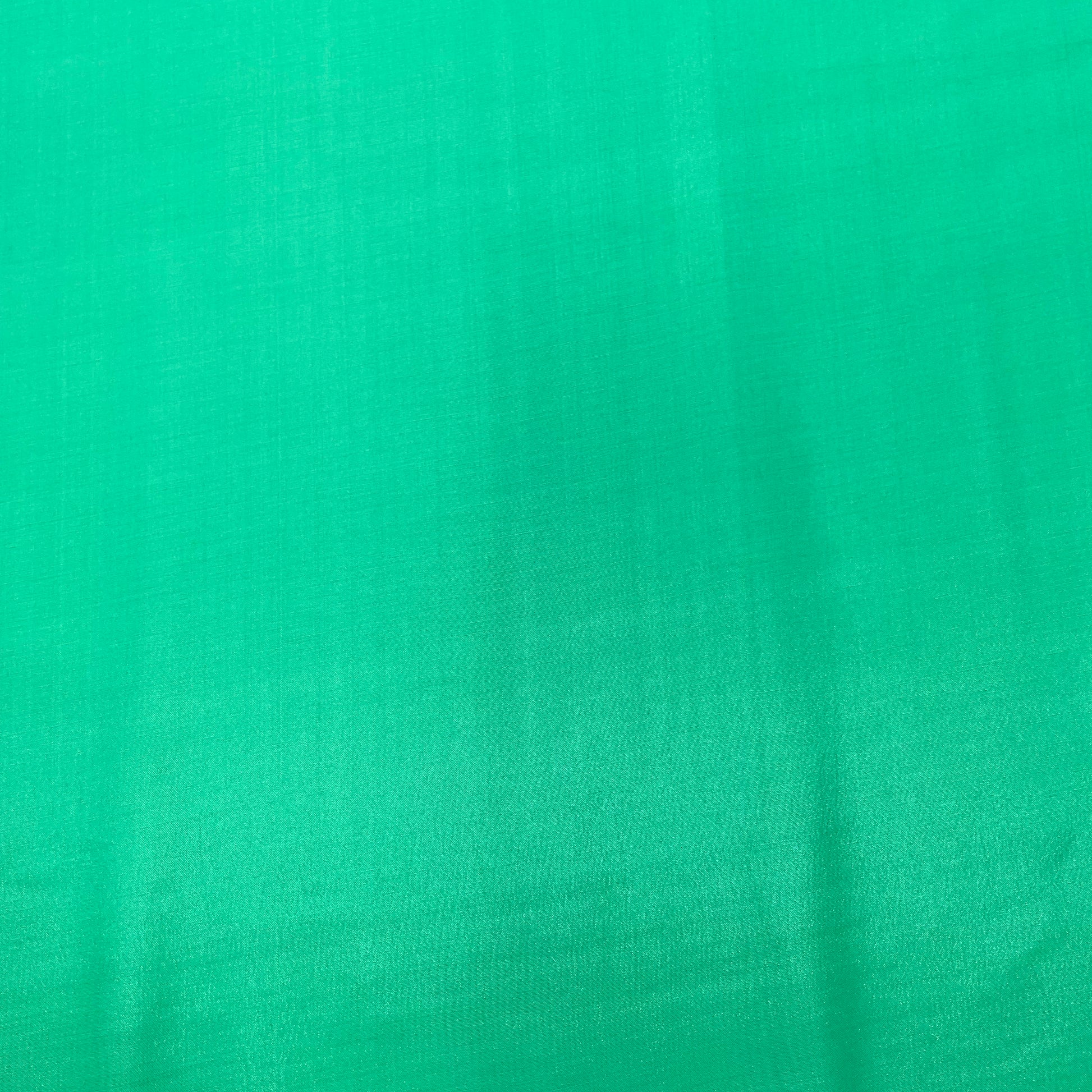 Parrot Green Solid Santoon Fabric - TradeUNO