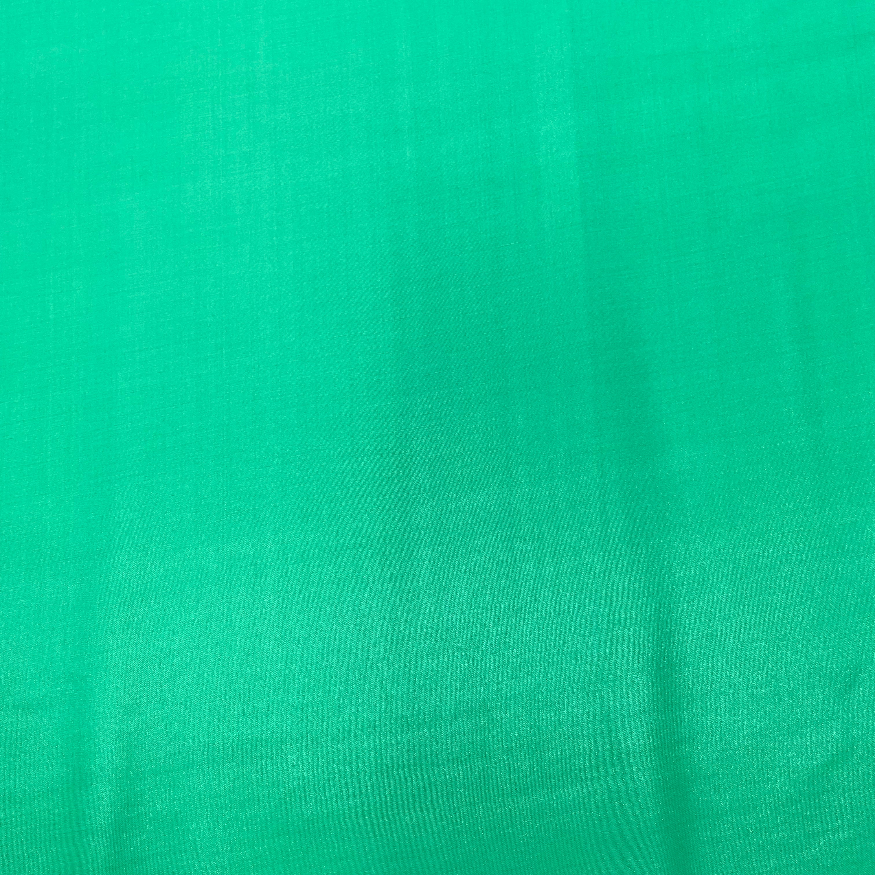 Parrot Green Solid Santoon Fabric - TradeUNO