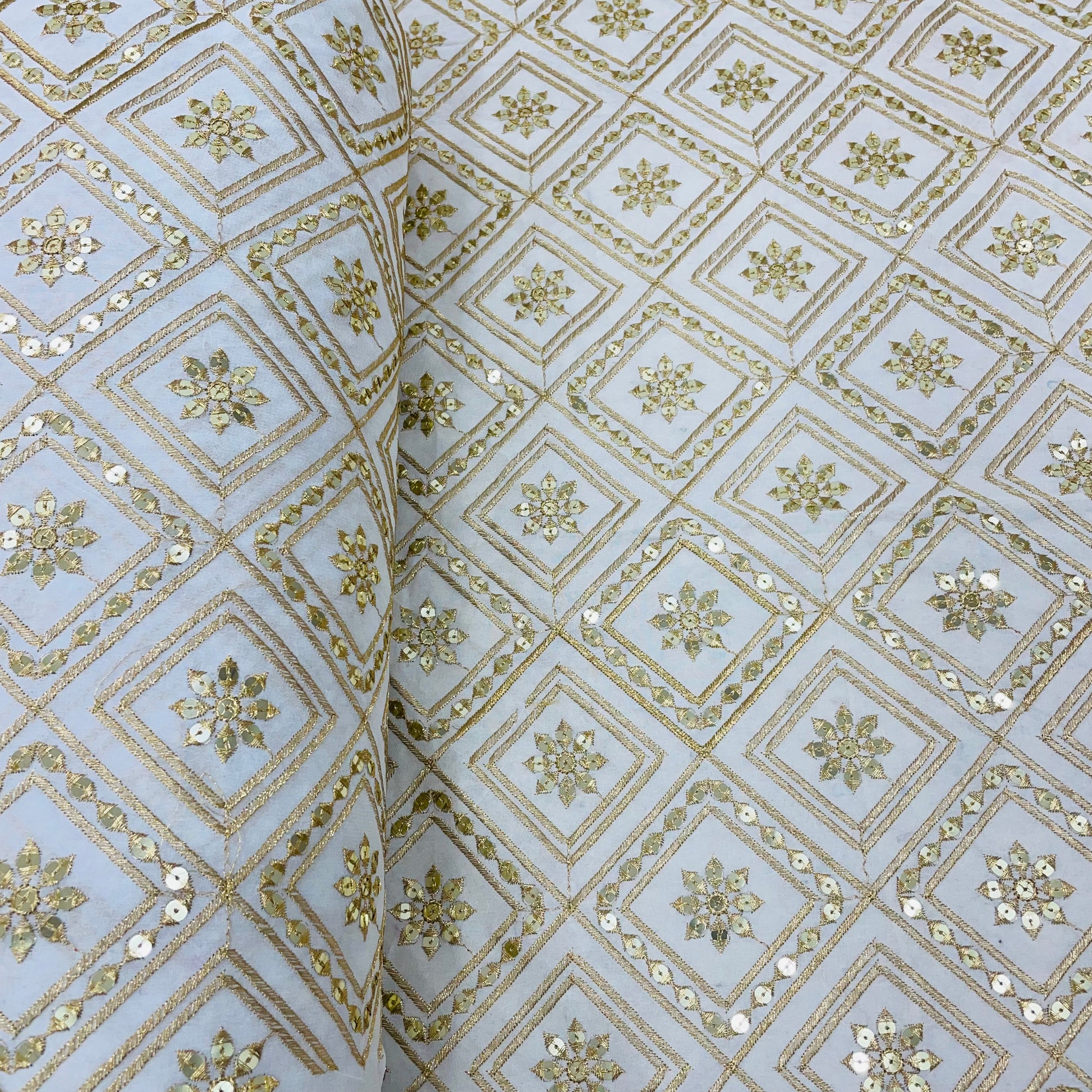 White with gold zari Embroidery Sequence Dyeable Georgette Fabric - TradeUNO