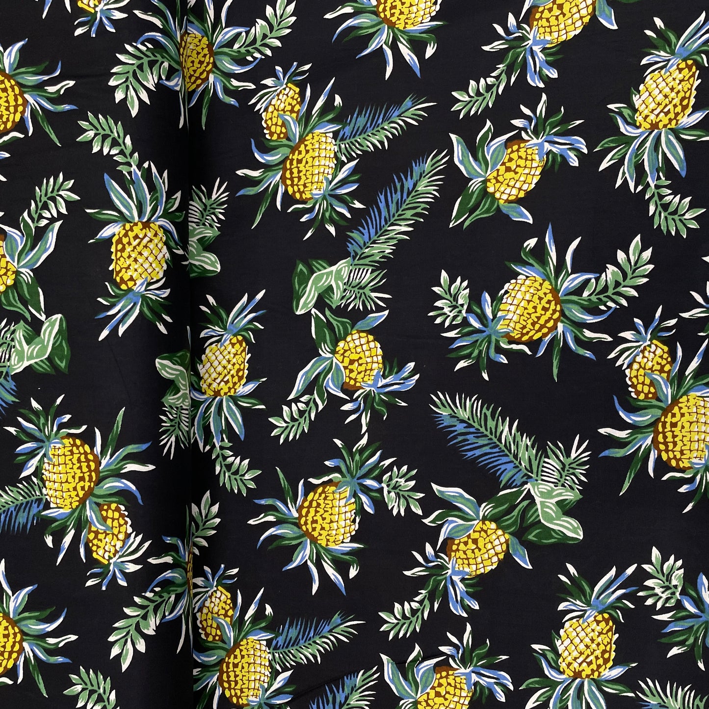 Black With Green Floral Print Rayon Fabric - TradeUNO