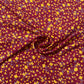 Red With Yellow Floral Crepe Fabric - TradeUNO