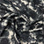 White With Black Floral Crepe Fabric - TradeUNO