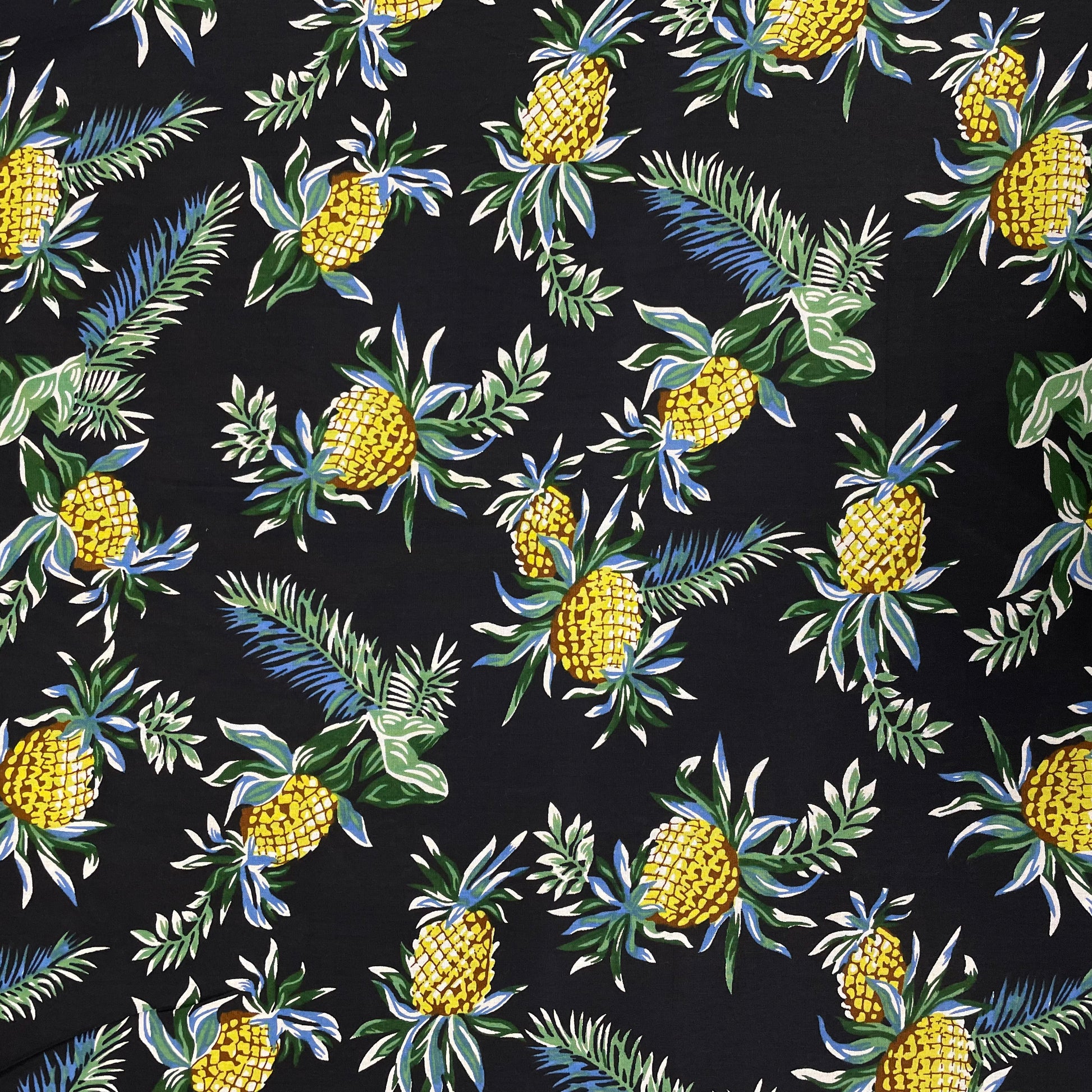Black With Green Floral Print Rayon Fabric - TradeUNO