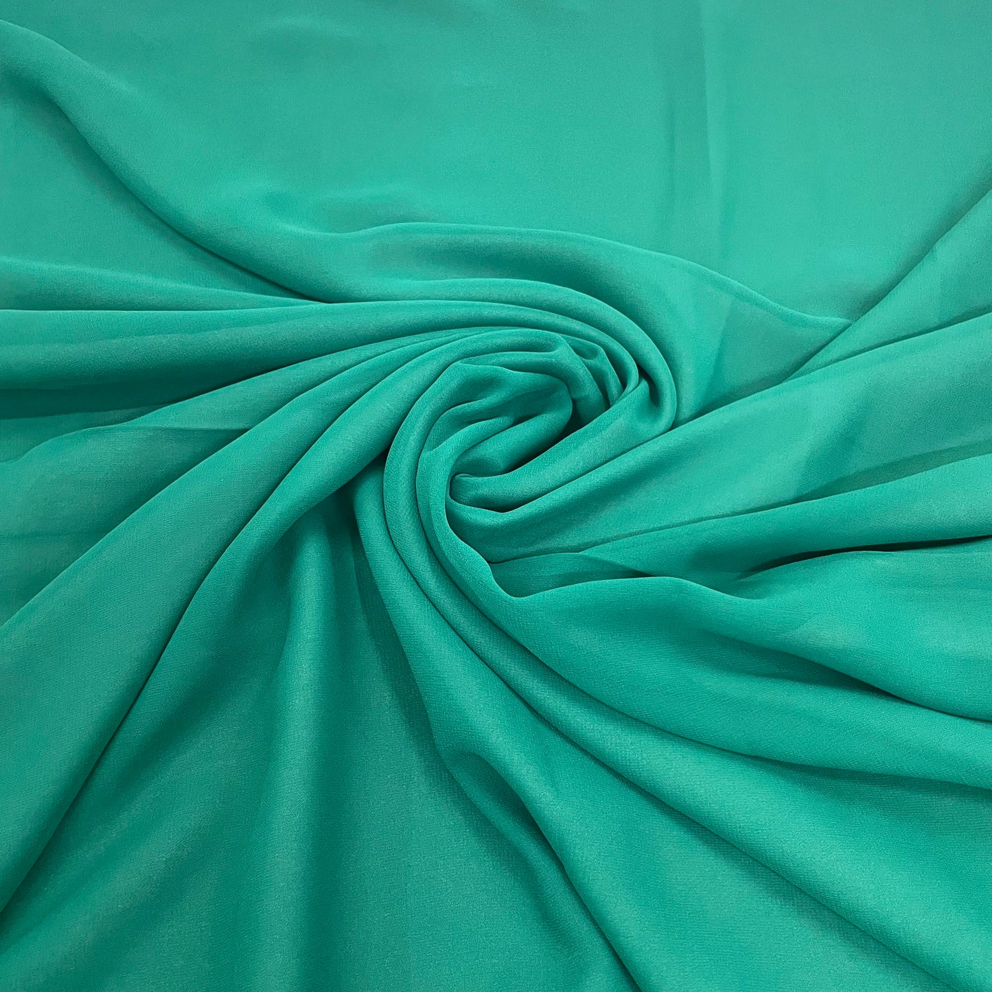 Cadmium Green Solid Georgette Fabric - TradeUNO