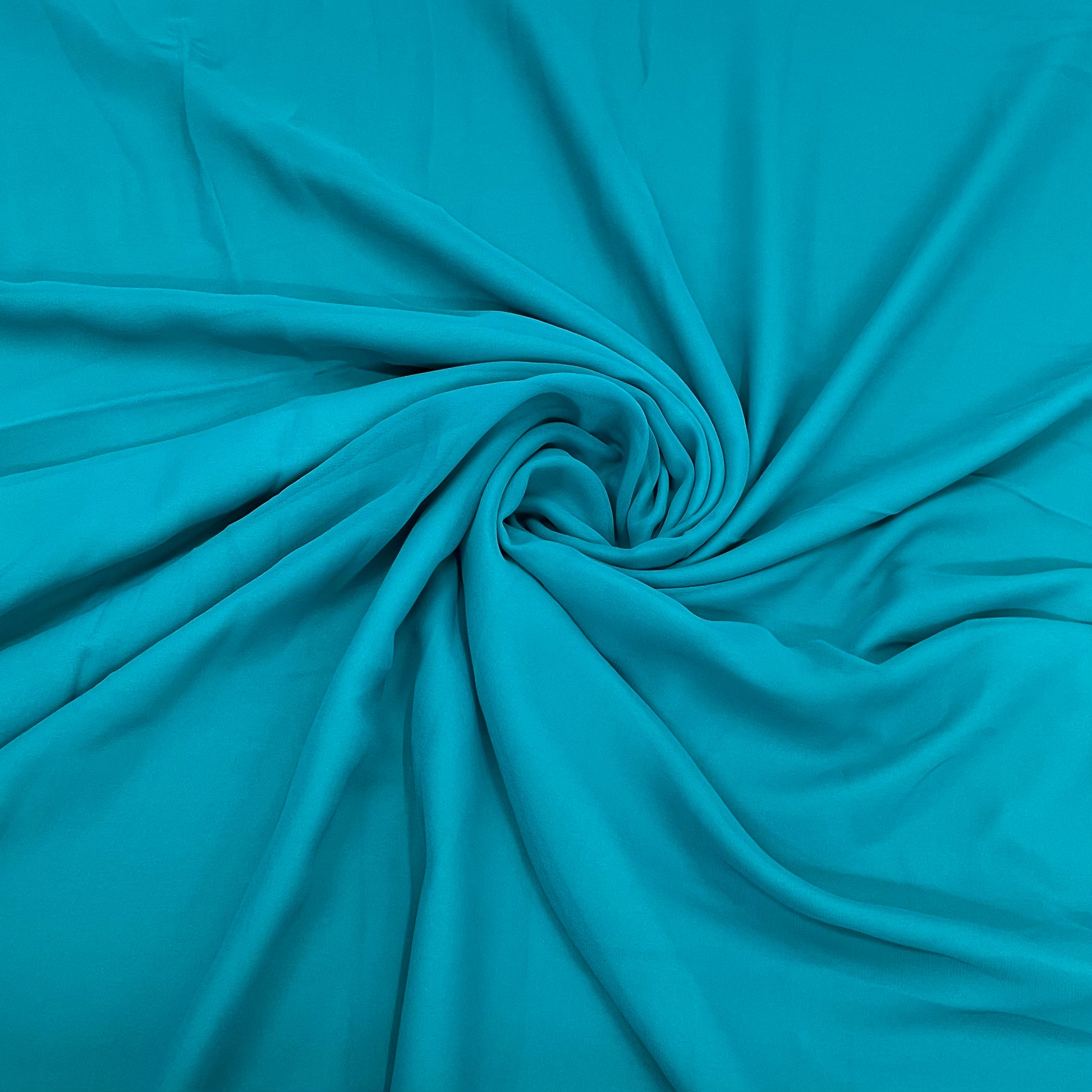 Teal Blue Solid Georgette Fabric - TradeUNO